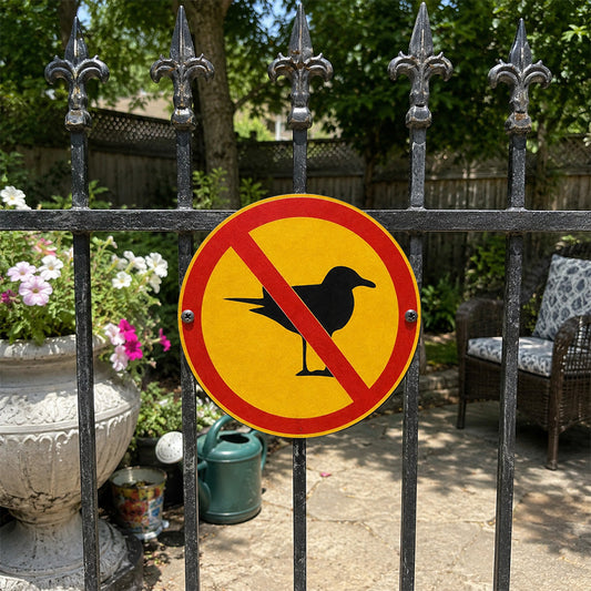 Animal Metal Sign Displayed on a fence