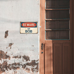 Custom “Beware of Your Name” Metal Sign