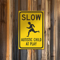 Slow – Autistic Child at Play Safety Sign (Yellow/Black)
