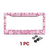 Personalized Pink Cherry Blossom license plate frame in a 1-piece pack with mounting hardware