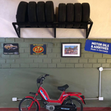 STP Oil Treatment – “The Racer’s Edge” Tin Sign