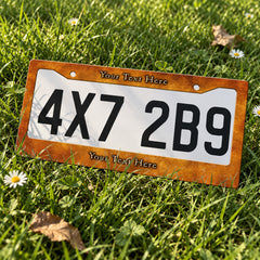 Custom Rustic Burnt Orange license plate frame displayed on a plate outdoors