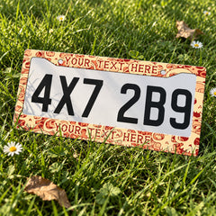 Custom Skull Pattern license plate frame displayed on a plate outdoors