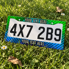 Custom Green and Blue Plaid license plate frame displayed on a plate outdoors