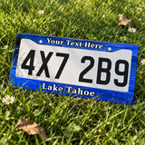 Personalized Lake Tahoe license plate frame displayed on a plate outdoors