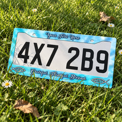 Custom Christian Grateful Thankful Blessed license plate frame displayed on a plate outdoors