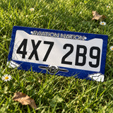 Aviation Nation Vintage Propeller license plate frame displayed on a plate outdoors