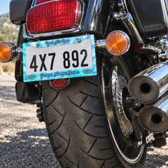 Personalized Christian Grateful Thankful Blessed license plate frame installed on a motorcycle