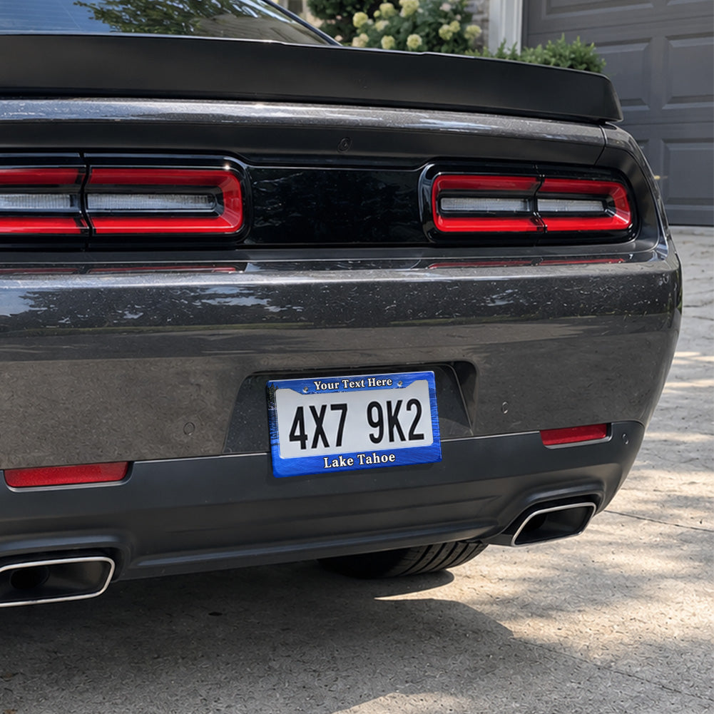 Lake Tahoe license plate frame installed on a black sports car