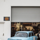 STP Oil Treatment – “The Racer’s Edge” Tin Sign