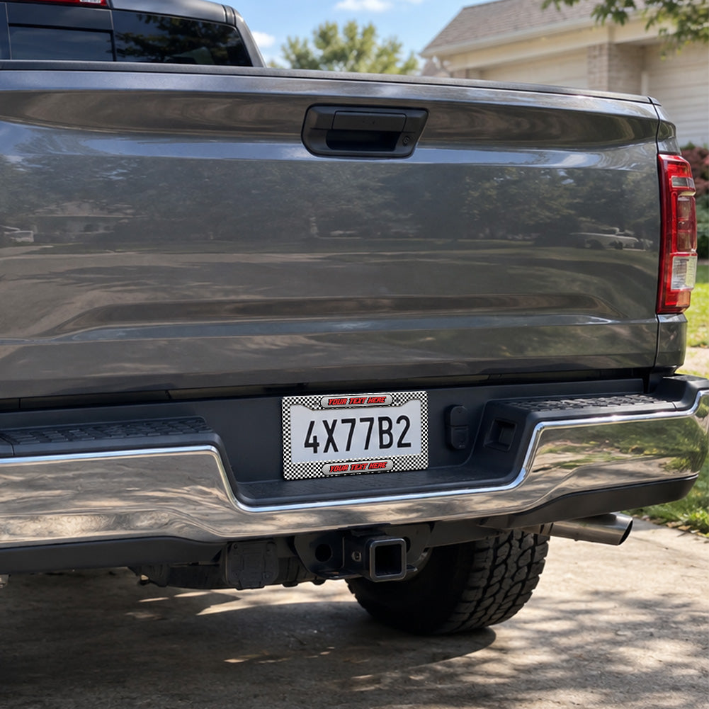 Custom Black and White Checkered Racing license plate frame installed on a pickup truck