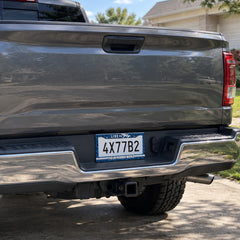 Live to Fly Aviation license plate frame installed on a pickup truck