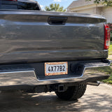 Custom Skull Pattern license plate frame installed on a pickup truck